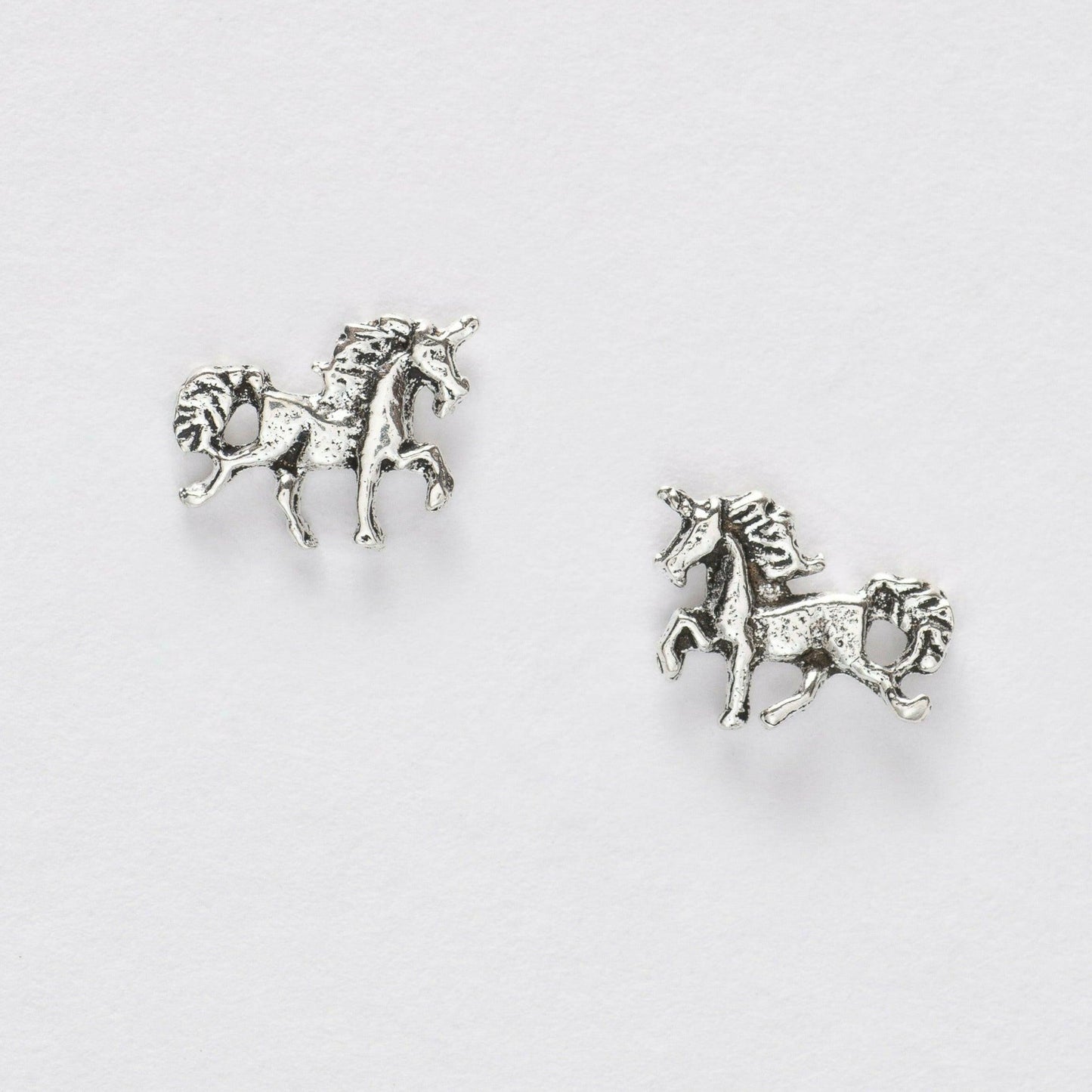 Unicorn Silver Stud Earrings - Magical Jewellery for All Ages - Crumble and Core