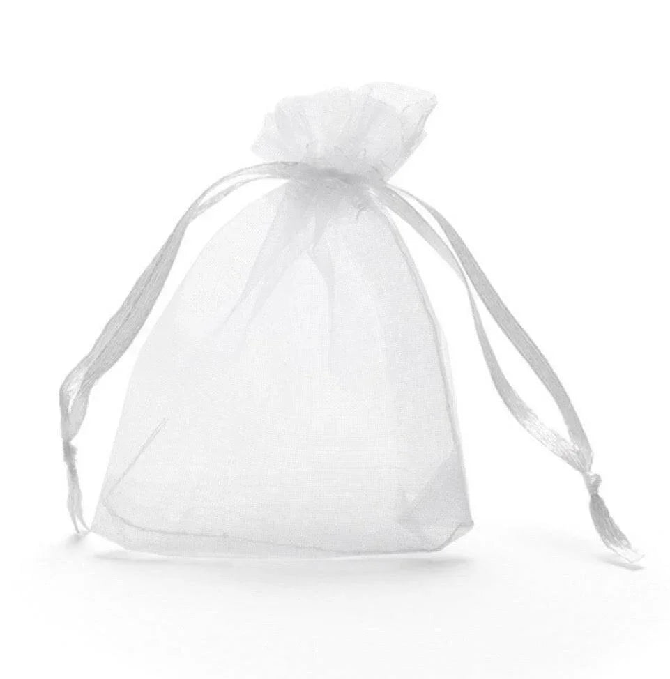 A white, transparent bag with a ribbon tied around it, sitting on a white background.