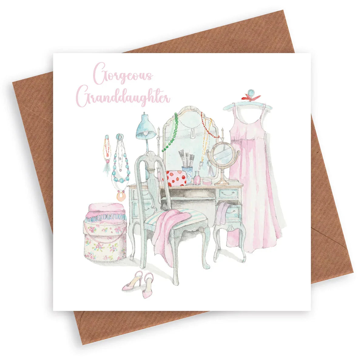 Greeting card with illustration of a vanity table, pink dress, heels, and text 'Gorgeous Granddaughter'.