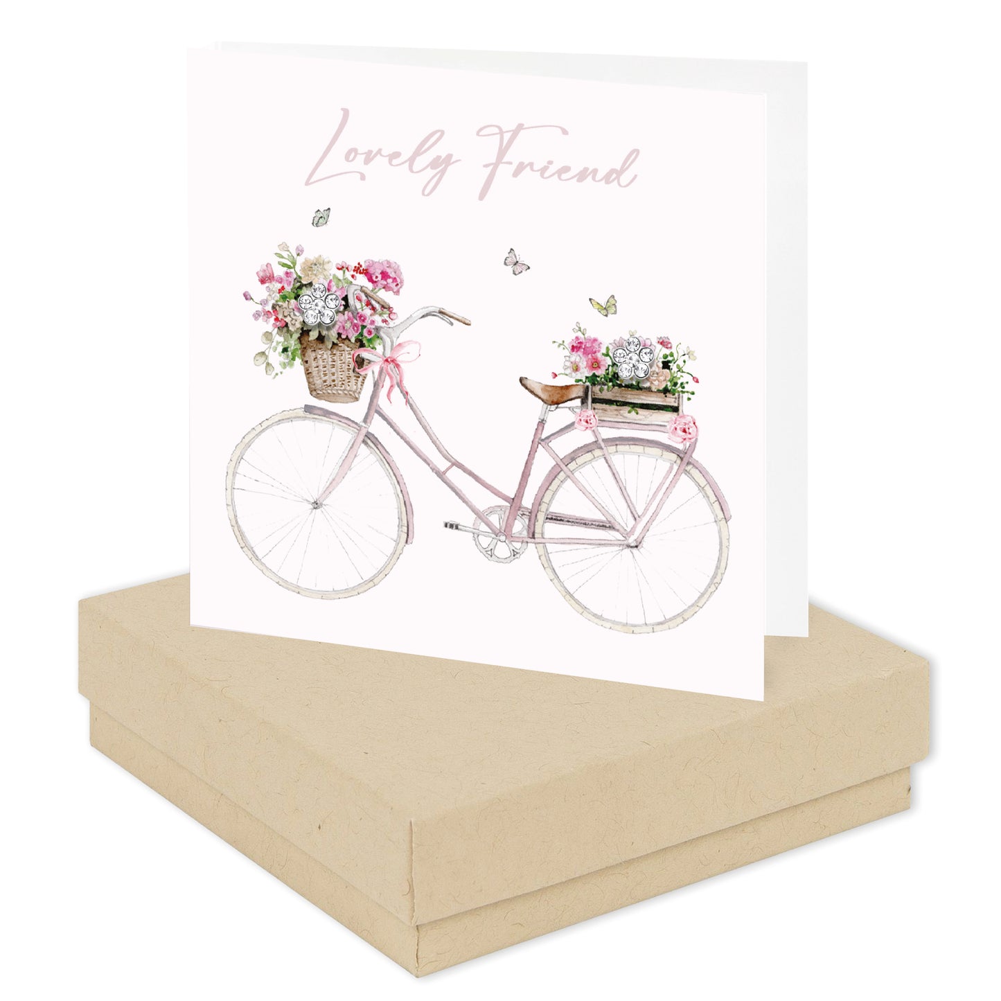 Lovely Friend greeting card with pink bicycle and floral baskets, displayed on a kraft gift box