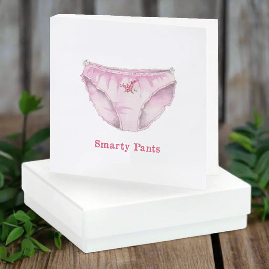 Tarjeta de aretes Lucky Pants en caja