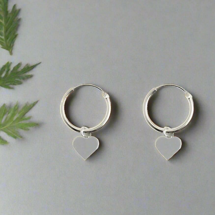 Silver Heart Huggie Hoop Earrings Delicate Stylish Jewellery - Crumble and Core