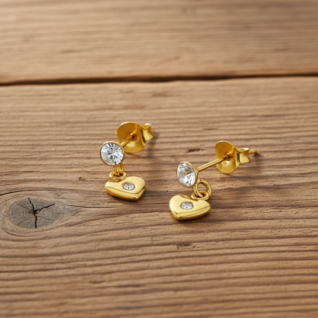 Orecchini a bottone in argento con zirconi cubici