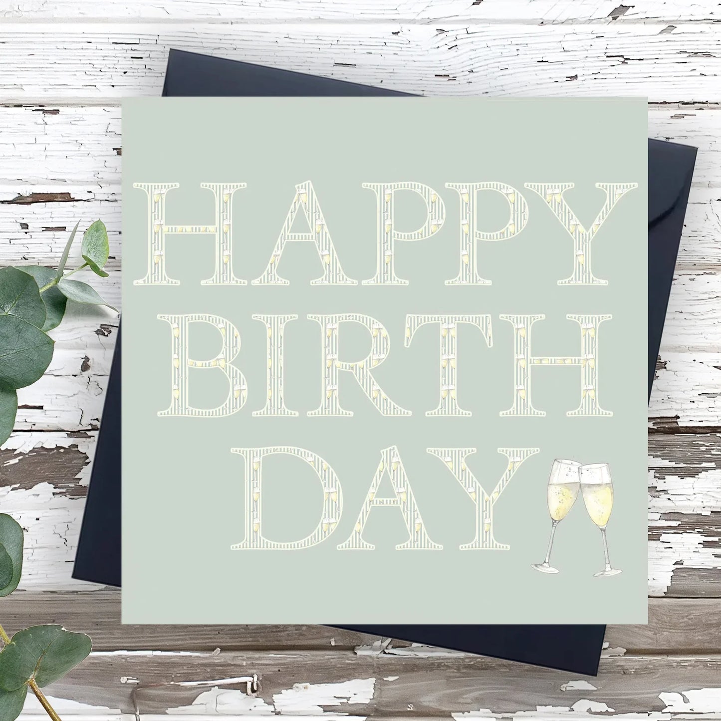 Happy Birthday card with champagne glasses illustration on rustic wood background