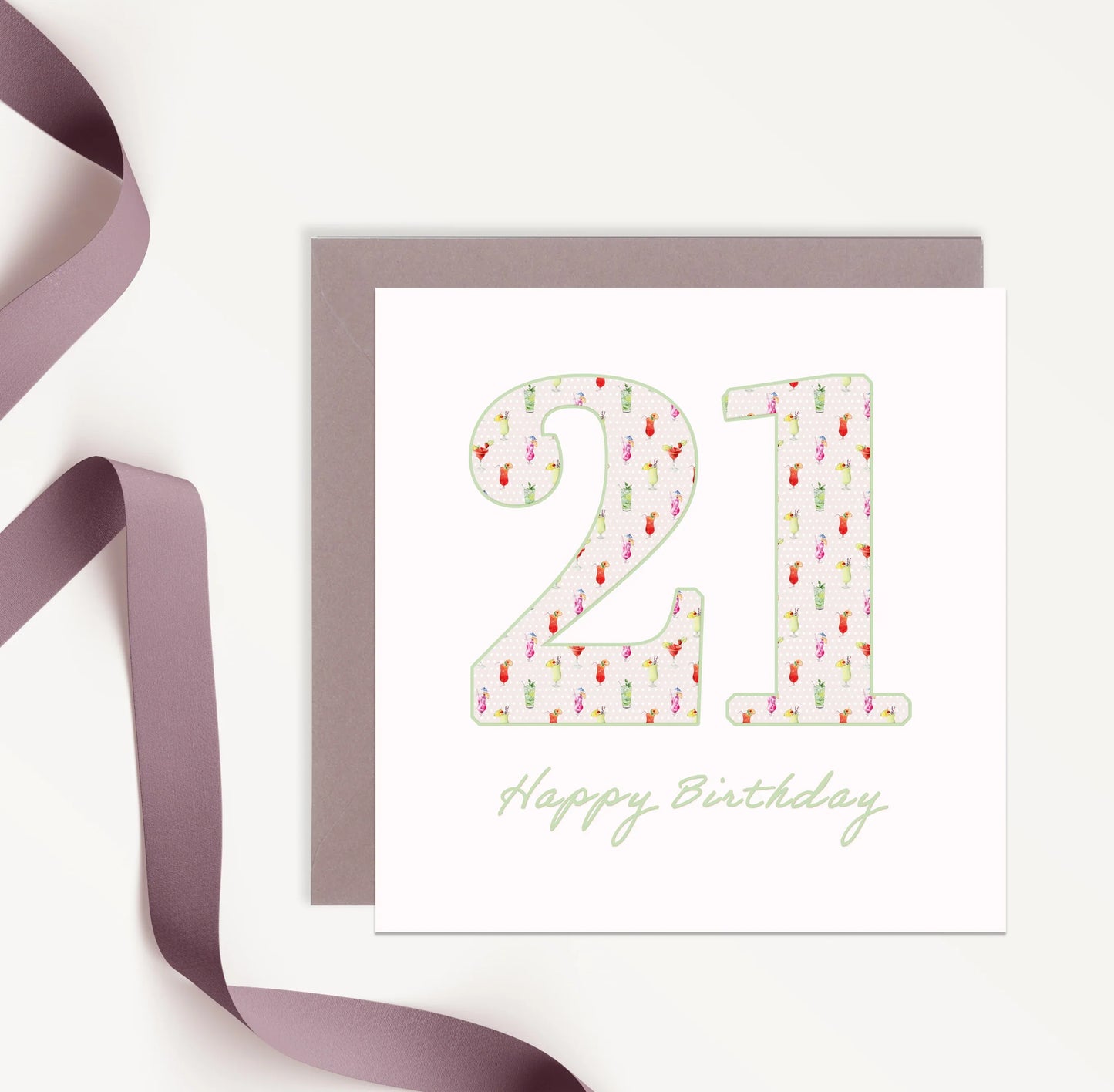 21st birthday card with floral pattern, purple envelope, and ribbon, Happy Birthday text