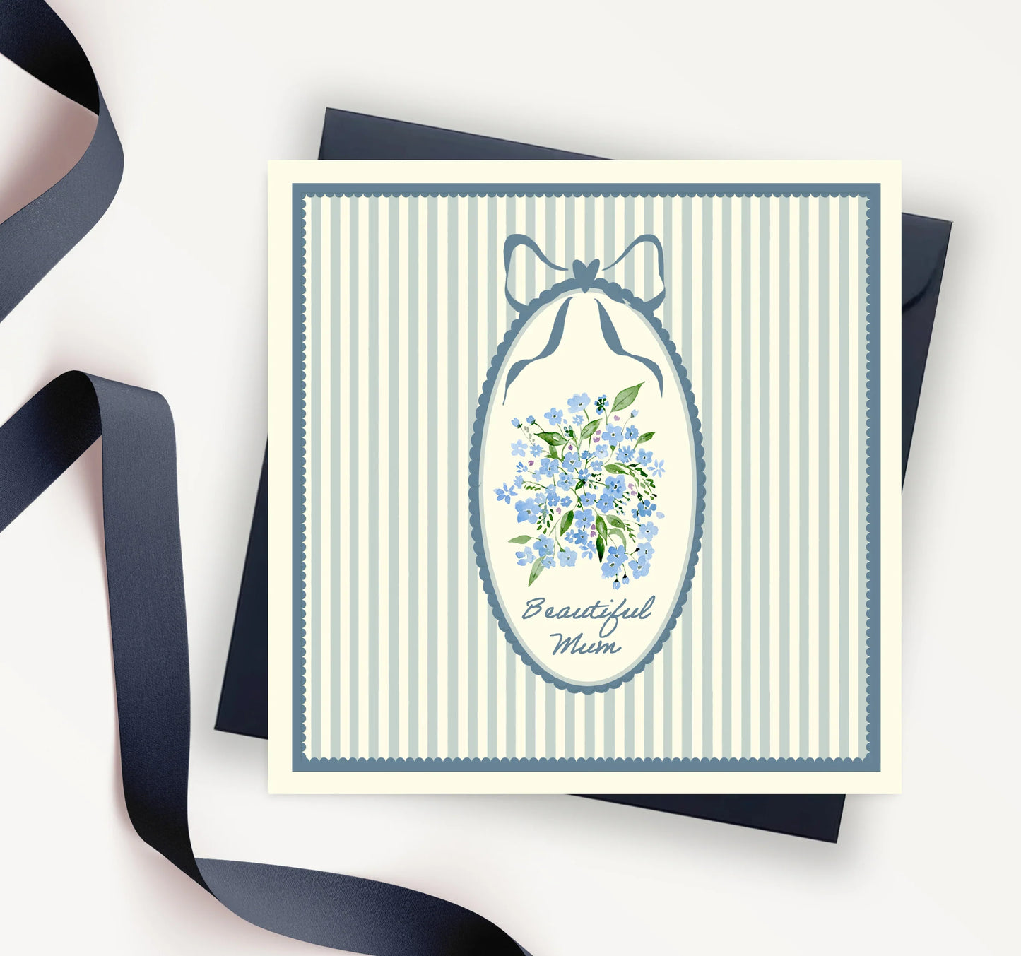 Handcrafted greeting card for mum with blue floral bouquet and striped border