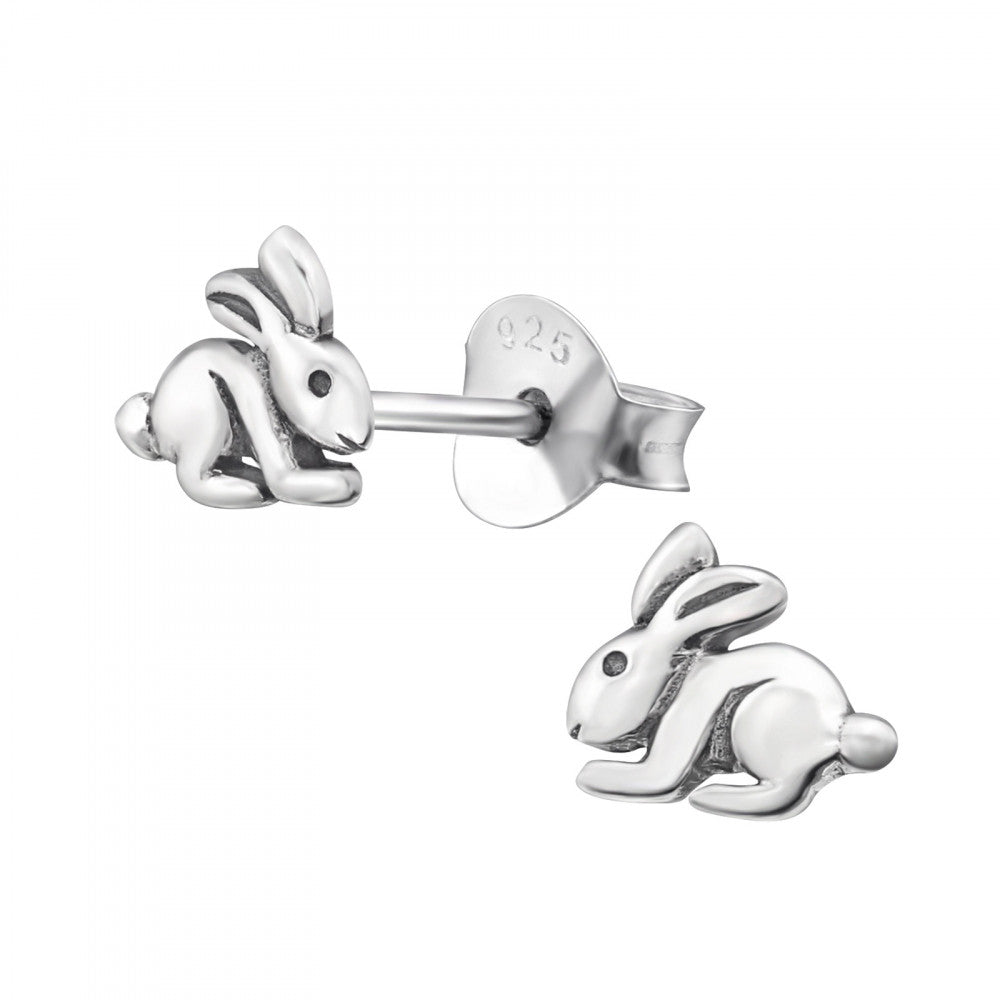 Sterling silver bunny stud earrings on white background