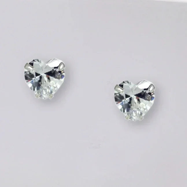Heart-shaped cubic zirconia stud earrings on a white background
